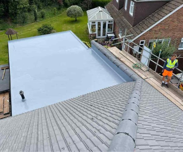 This is a photo of a newly installed hip roof, with a combined liquid covered flat roof. Work carried out by WS Roofing South Elmsall